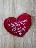 “If lost please return to” keychain